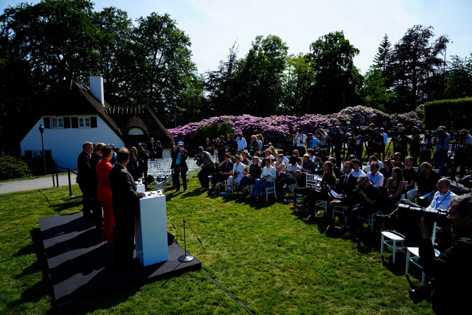 Partilederne Mette Frederiksen (S), Pia Olsen Dyhr (SF), Lars Løkke Rasmussen (M) og Martin Lidegaard (RV) præsenterer regeringsgrundlaget for en ny regering i Danmark, på Marienborg tirsdag den 2. juni 2026.